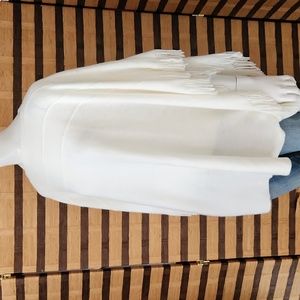 Knit fringe poncho creme